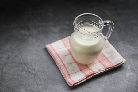 Fresh milk natural in a glass jug / Serving breakfast milk conceptの写真素材