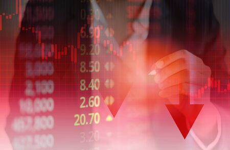 Businessman trading stocks market financial depressed / Crisis stock market graph chart down trend red price drop arrow down chart fall investment loss crash business crisis economyの写真素材