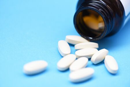 Medicine pills and bottle of medicine drugs concept / Vitamins Supplement food