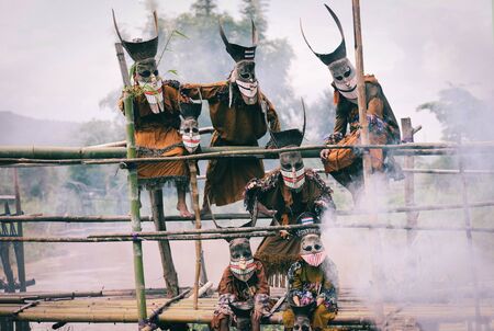 Phi ta khon or halloween of Thailand / phi ta khon festival ghost mask and colorful costume fun traditional thailand mask the show art and culture loei province Dan Sai thailand festivalの写真素材