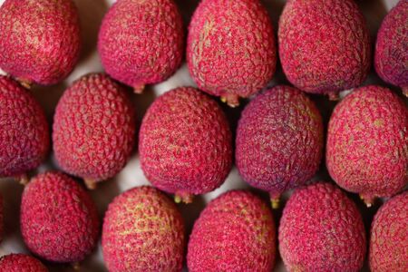 Lychee texture background top view / Fresh lychee harvest from tree tropical fruit summer in Thailand の写真素材
