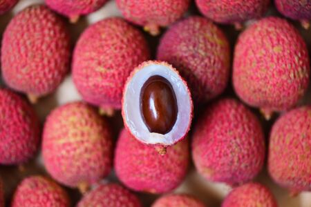 Lychee slice peeled texture background top view / Fresh lychee harvest in from tree tropical fruit summer in Thailandの写真素材