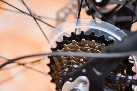 Rear wheel and chain in a mountain bike / The back disc brake bike , bicycle gearsの写真素材