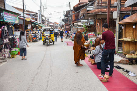 Chiang Khan Loei Thailand - 13 September 2020 : tourists at Chiang Khan walking Street in ancient community local travel and shopping in holidayのeditorial素材