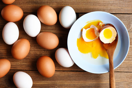 Chicken eggs and duck eggs collect from farm products natural on wooden healthy eating concept, ...