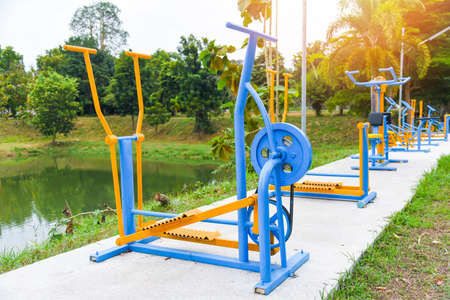 Outdoors gym playground equipment in the public garden, outdoor fitness equipment in the parkの写真素材