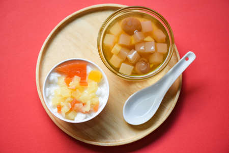 Chinese desserts, milk pudding fruit salad and Mix ginkgo nuts cassava syrup coconut jelly in longan...