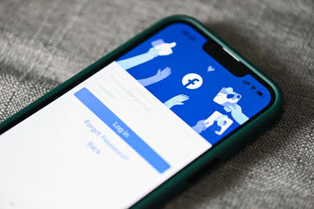 Facebook application icon on Apple iPhone 13 Pro, smartphone with login home page facebook logo icon on the screen popular social media network from Meta : Bangkok, Thailand - June 3 2022のeditorial素材
