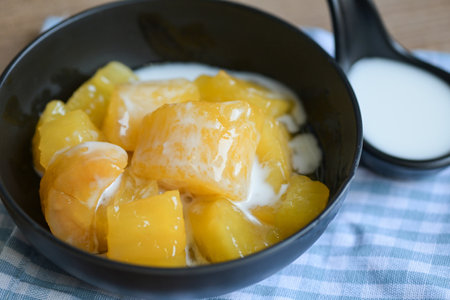 cassava food on the table food, sweet dessert made of boiled cassava, sugar and coconut milik - Thai foodの写真素材