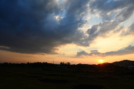 Beautiful sky sunlight, Sunrise or sunset and shines sky with clouds colorful and mountain background - Twilight cloud on sky in countrysideの写真素材