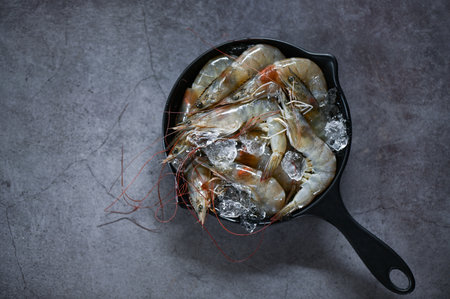 Raw shrimps prawns on ice in bowl, Fresh shrimp seafood , white shrimp top viewの写真素材