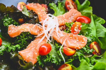 salmon salad food salmon fillet with vegetable lettuce leaf tomato herb and spices, fresh raw salmon fish for cooking food seafood salmon fish healthy foodの写真素材