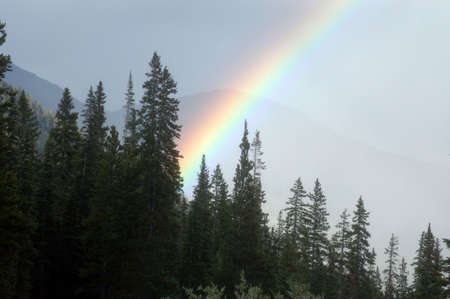  rainbow over the rockiesの写真素材
