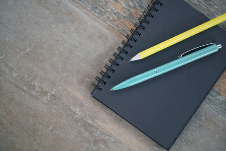 Notepad and pencilsの写真素材