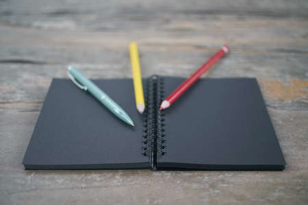 Notepad and pencilsの写真素材