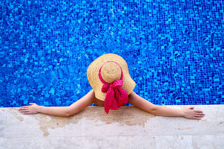 a woman in the relaxing pool