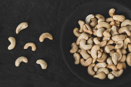 fresh and delicious cashews on the tableの写真素材