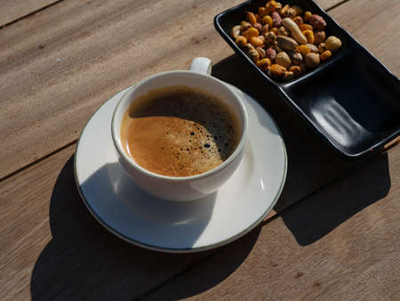 espresso coffee and snack nutsの写真素材