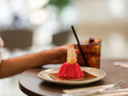 a delicious cupcake and a cocktailの写真素材