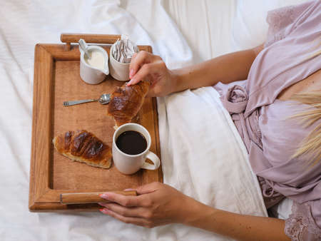 coffee and croissant for breakfastの写真素材