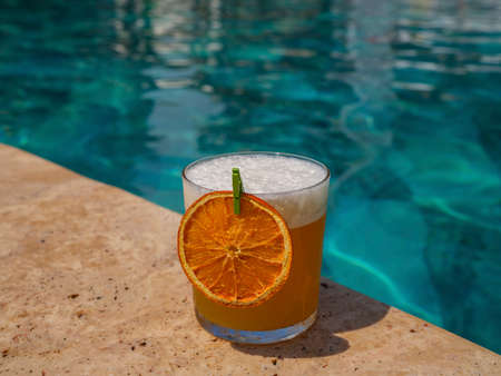 delicious cocktail by the poolの写真素材