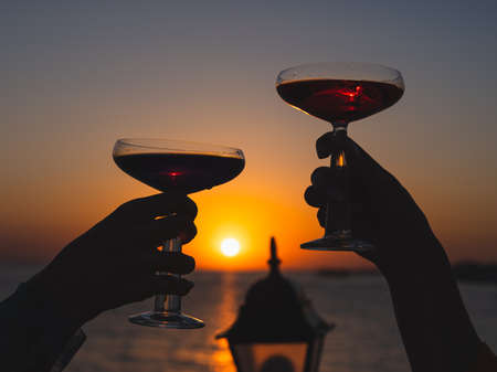 a romantic honeymoon celebration at sunsetの写真素材