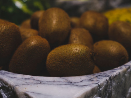 delicious kiwis on the plateの写真素材