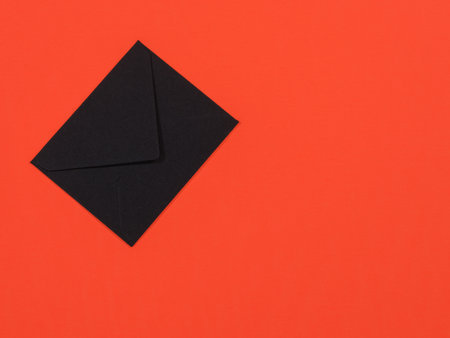 black letter on orange backgroundの写真素材
