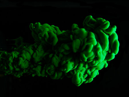 Abstract color paint splash isolated on black backgroundの写真素材