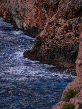 beautiful waves crashing on rocks