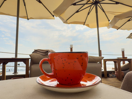 Close-up of coffee by the seaの写真素材