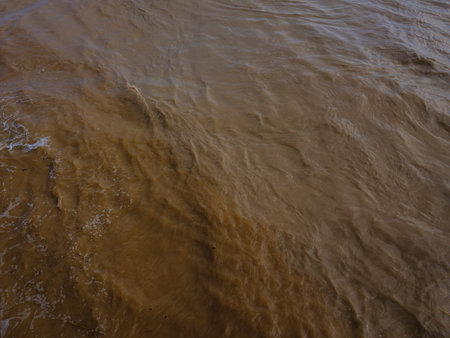 Muddy river after heavy rainfallの写真素材
