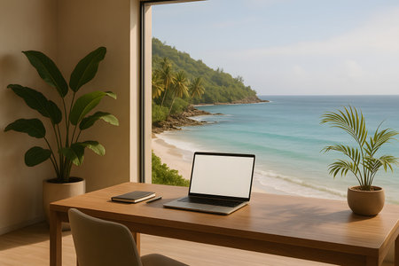 Minimalist remote workspace with ocean view, plants, and warm light, representing modern digital nomad lifestyle.の写真素材