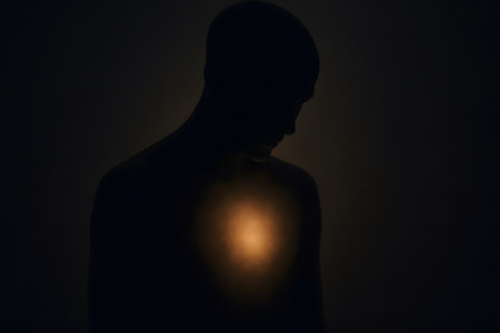 A minimalist symbolic representation of emotional pain and recovery using light and shadow. Great for psychology, mindfulness, and emotional health visuals.の写真素材