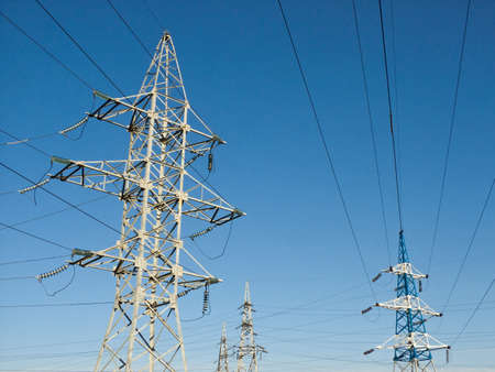 Towers of power against the blue sky in Russiaの写真素材