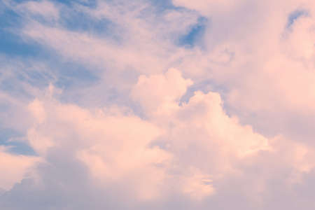 View of the clouds through a light filter. Background. Abstraction. Texture. Azure, blue, pink