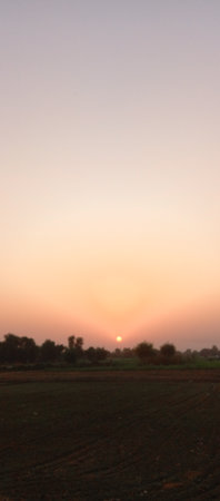 blur  in  philippines  view of the sunset from the field
