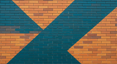 Orange and blue brick wall texture. Abstract background for design with copy space.の素材