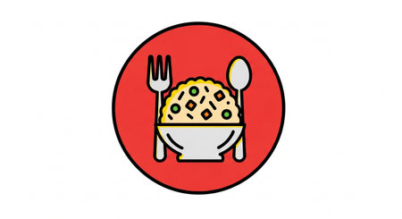 a delightful bowl of rice with fork and spoon, perfect for a tasty lunch or dinner in a restaurant settingの素材