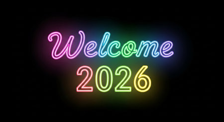 A bright, colorful neon sign welcomes the new year of 2026 with a glowing celebration.の素材