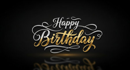 a beautiful happy birthday card with gold and silver lettering on a black backgroundの素材