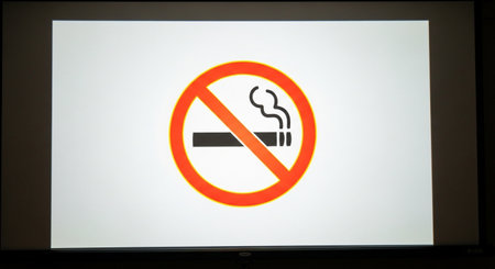 a no smoking sign with a crossed out cigarette, symbolizing smoke free environmentの素材