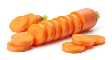 Carrot slices isolated on white background. Clipping path included.の素材
