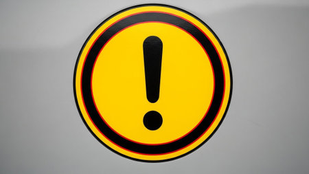 Exclamation mark on a white background. Close-up of a warning sign.の素材