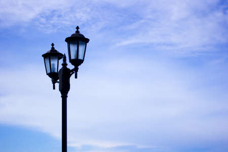 A street lamp with blue sky and cloudの写真素材