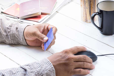 Man using credit card for payment shopping online around travel and journey.