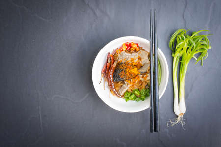 Noodles in Thailand Beef noodle on black table.Top view.の写真素材
