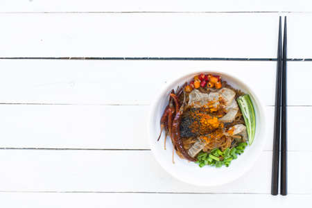 Noodles in Thailand Beef noodle on wooden white table.の写真素材