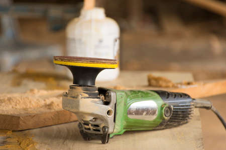 Sander tools  on wooden table suitable for background craftsman tool or background man working and etc.の写真素材