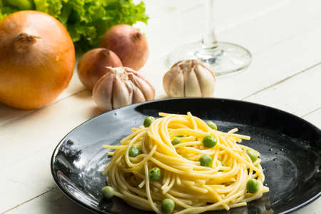 Spaghetti or pasta and ingredient on white table.Close upの写真素材